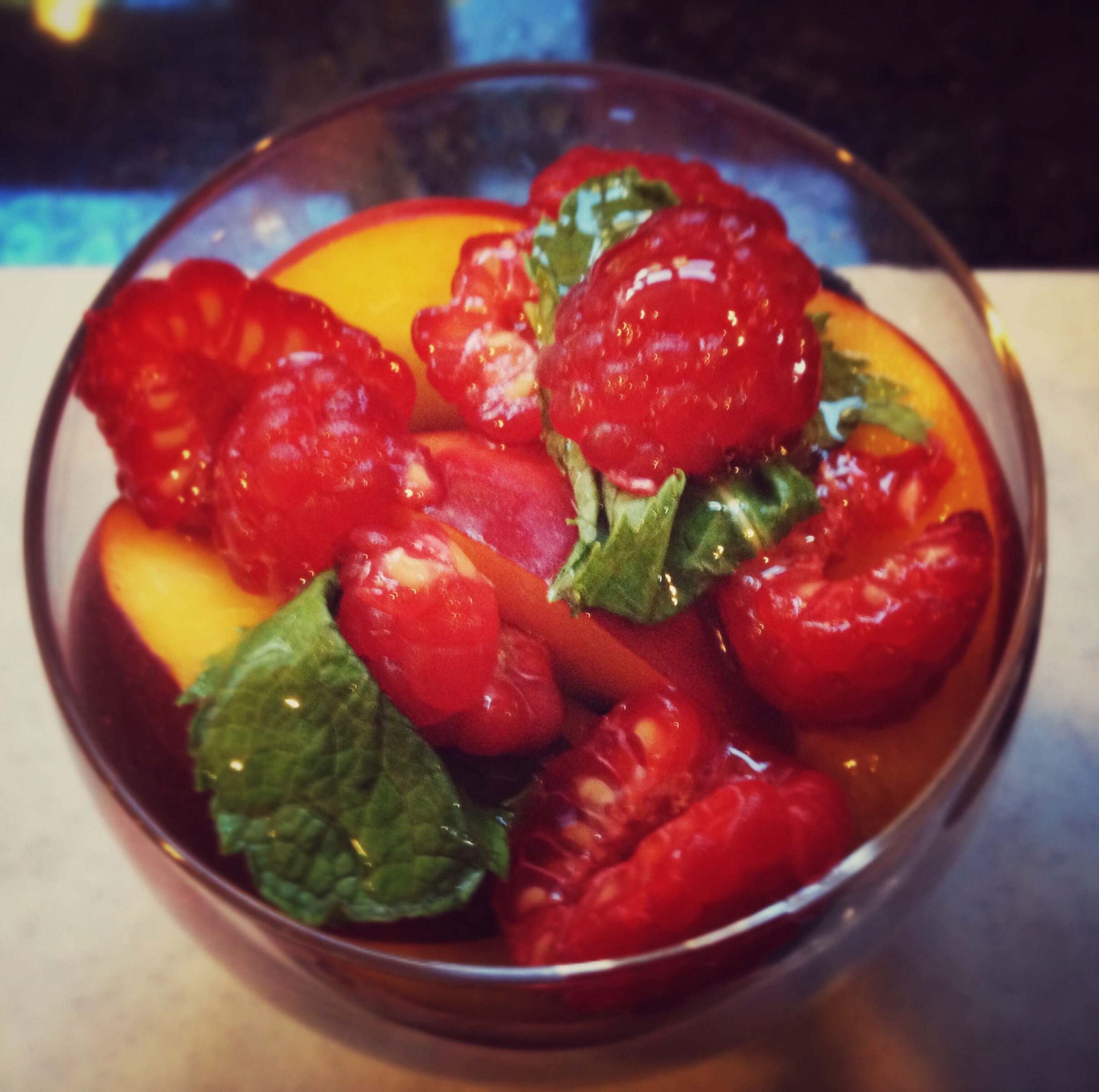 Summer fruit in a cup with mint